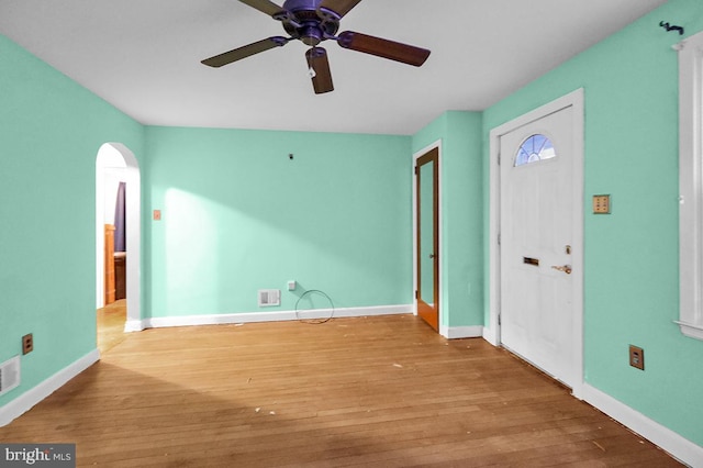 entryway with light hardwood / wood-style flooring and ceiling fan