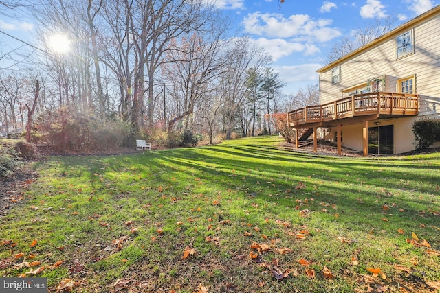 view of yard featuring a deck