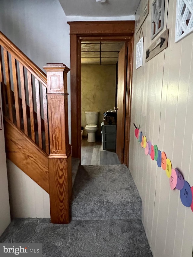 hallway with wooden walls