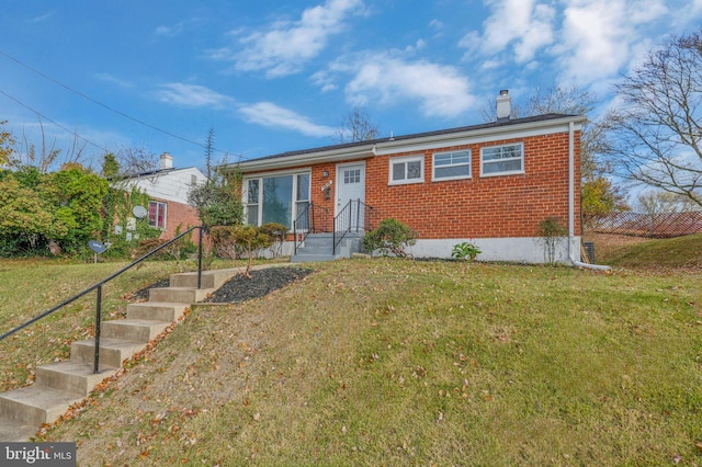 view of front of house with a front lawn