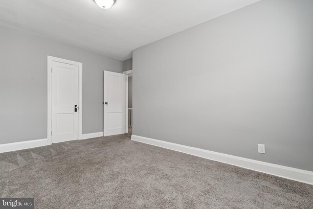 unfurnished bedroom with carpet flooring