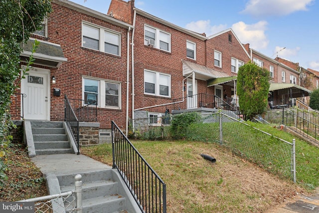 view of front facade with a front lawn