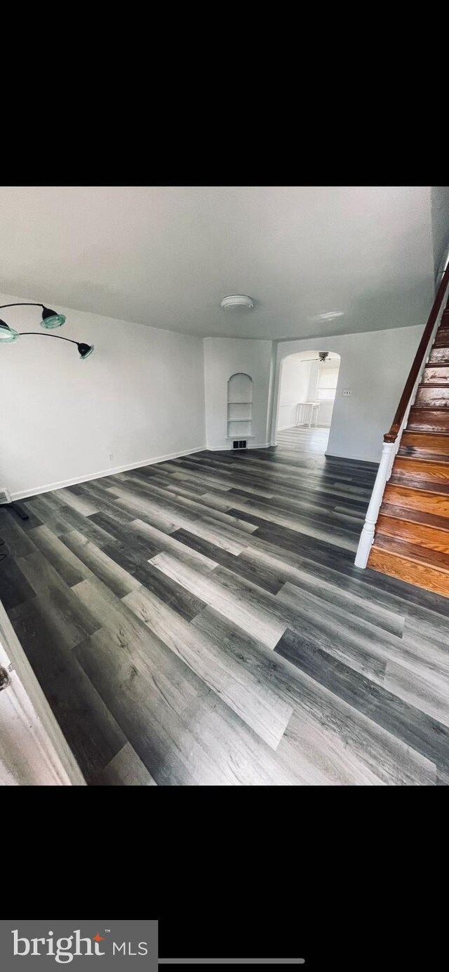 6412 Akron St, Philadelphia, PA 19149 - hallway featuring wood finished floors, stairway, and baseboards