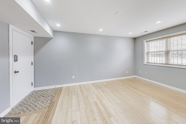 empty room with light wood-type flooring