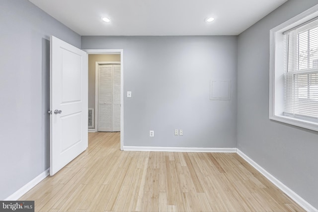 empty room featuring light hardwood / wood-style floors