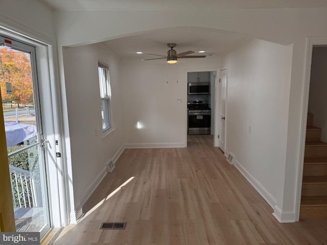 interior space featuring a healthy amount of sunlight and light hardwood / wood-style floors