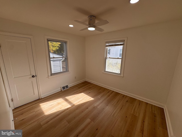 unfurnished bedroom featuring ceiling fan and light hardwood / wood-style floors