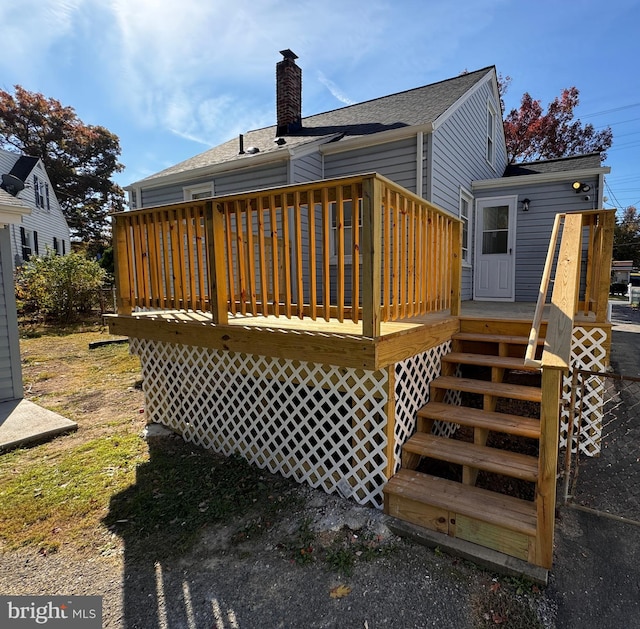 rear view of property with a deck