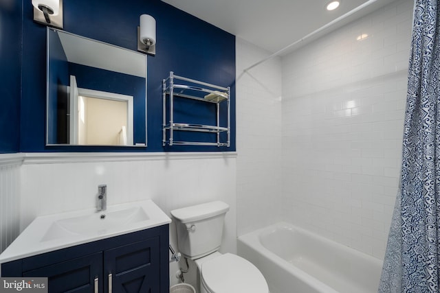 full bathroom with vanity, toilet, and shower / bathtub combination with curtain