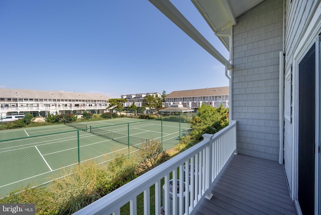 exterior space featuring tennis court