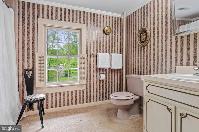 bathroom featuring wallpapered walls, crown molding, and vanity