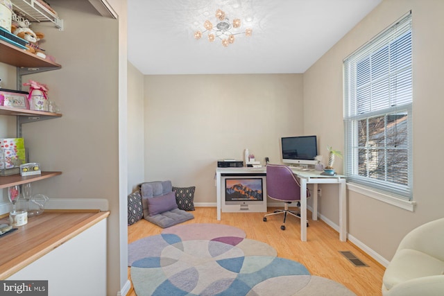 office area featuring light hardwood / wood-style flooring