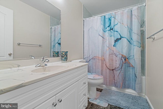 full bathroom featuring vanity, shower / bath combination with curtain, and toilet