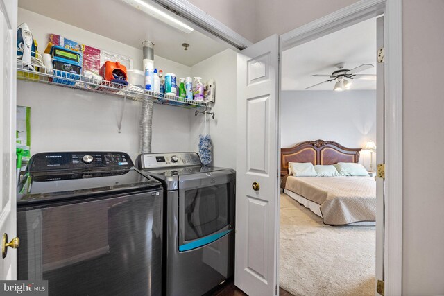 laundry area featuring a ceiling fan, laundry area, and washing machine and clothes dryer