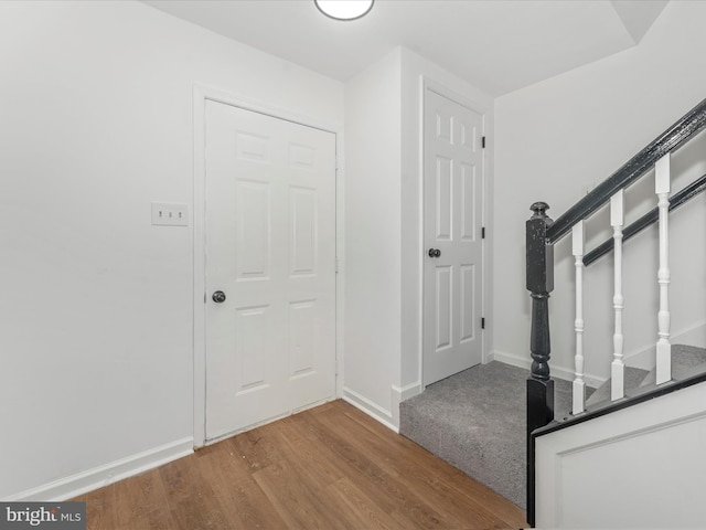 entrance foyer featuring hardwood / wood-style floors