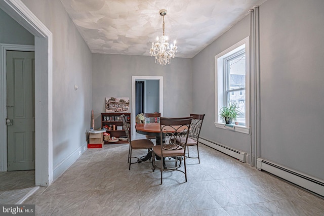 dining area featuring a notable chandelier and a baseboard radiator