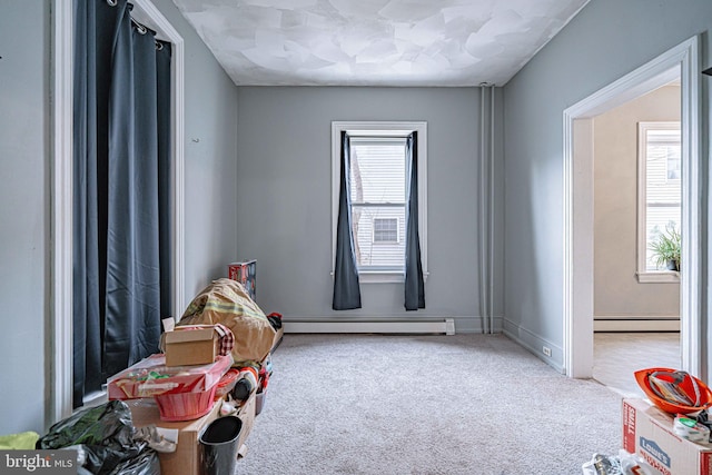 game room with carpet flooring and baseboard heating