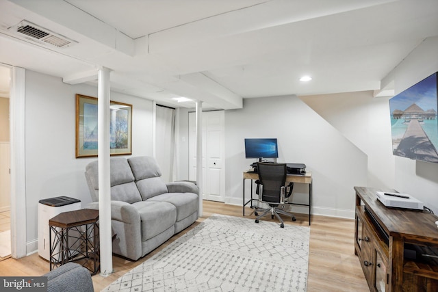 office area with light hardwood / wood-style floors