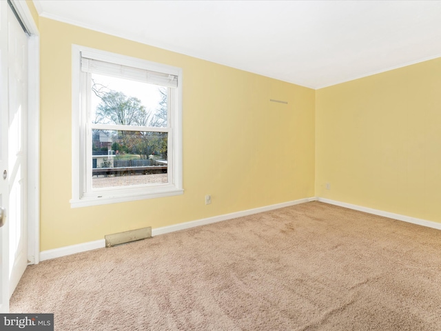 view of carpeted spare room