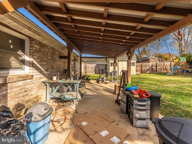 view of patio with a playground