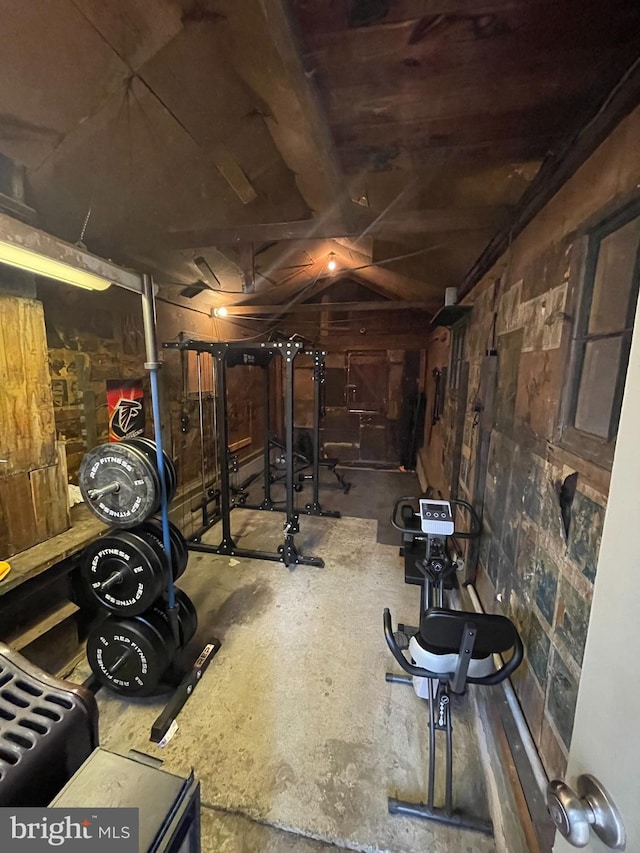 workout area featuring vaulted ceiling