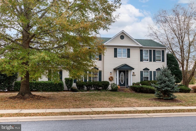 view of front of property with a front yard