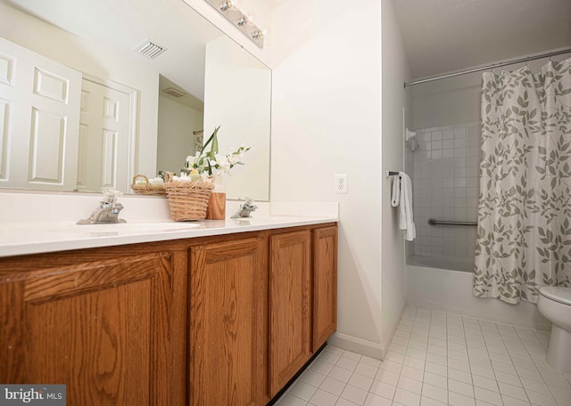 full bathroom featuring tile patterned flooring, vanity, shower / tub combo with curtain, and toilet