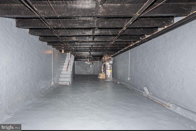 basement featuring gas water heater