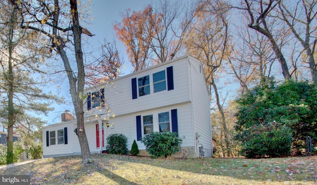 colonial house with a front lawn