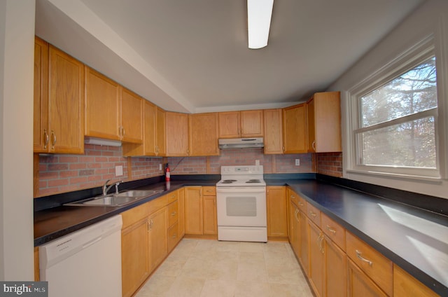 kitchen featuring backsplash, white appliances, sink, and light tile patterned floors