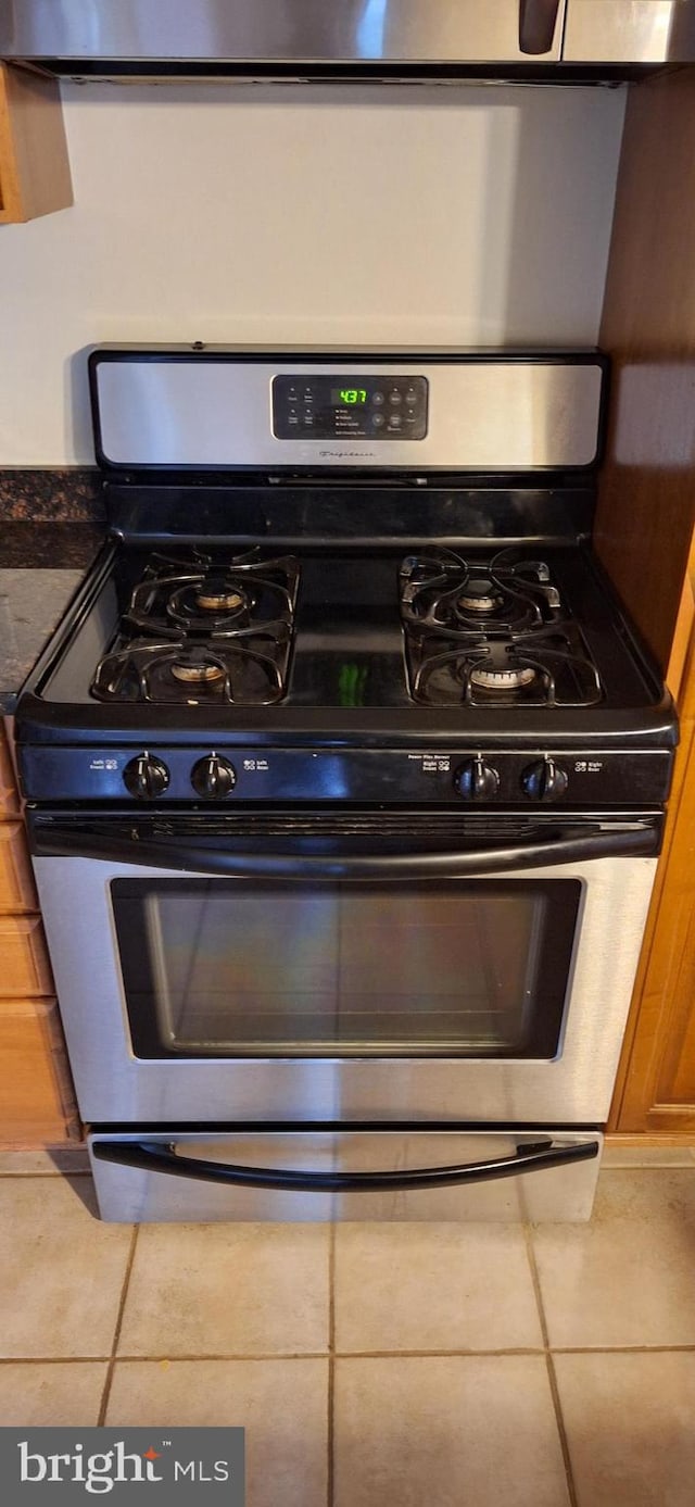 details featuring stainless steel range with gas stovetop