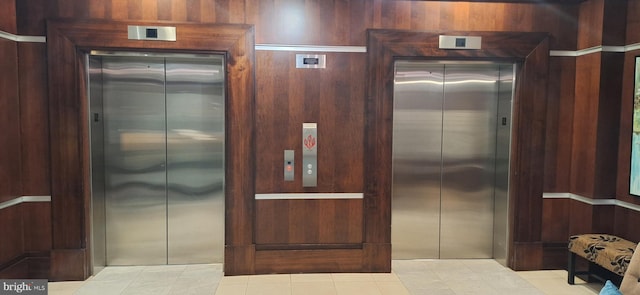 details with elevator and wooden walls