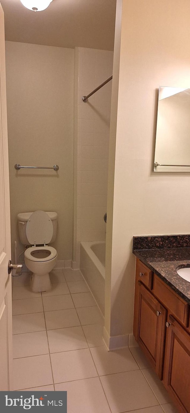 full bathroom with tile patterned floors, vanity, toilet, and bathtub / shower combination