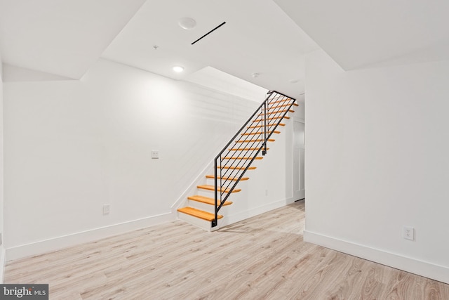 basement with light wood-type flooring