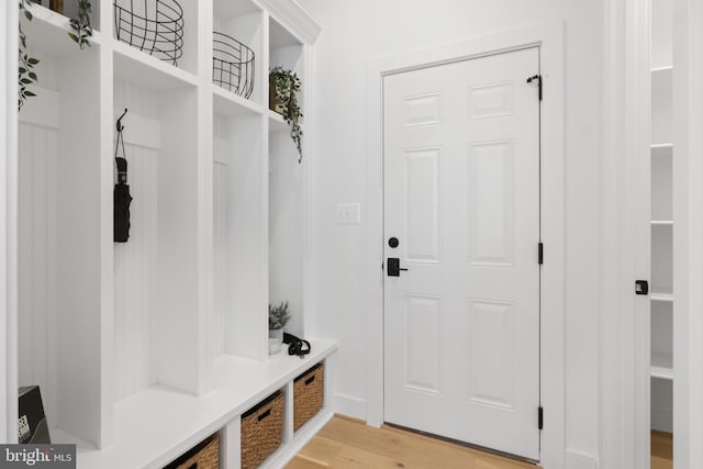 mudroom with hardwood / wood-style floors