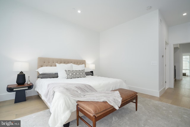 bedroom with light hardwood / wood-style floors