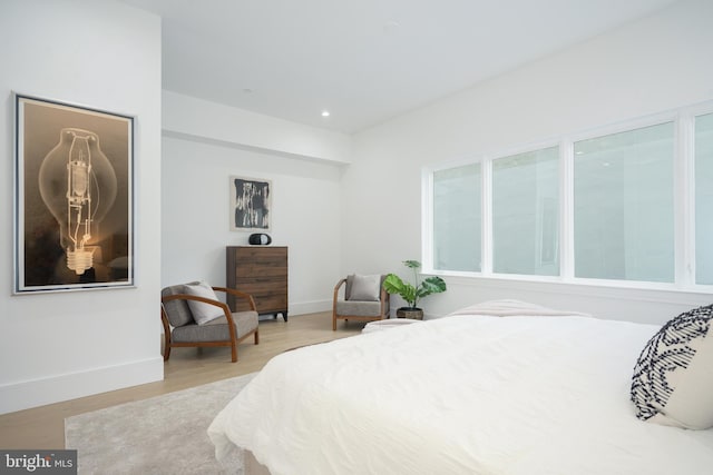 bedroom with light hardwood / wood-style flooring