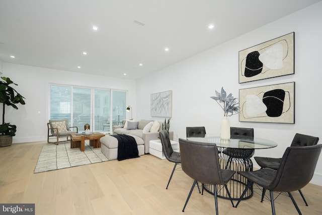 dining room with light wood-type flooring