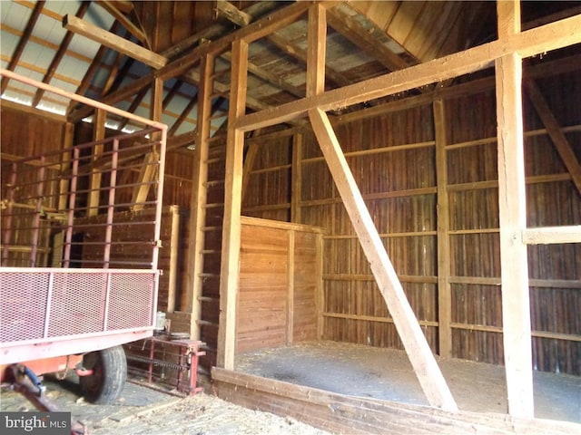 miscellaneous room with lofted ceiling