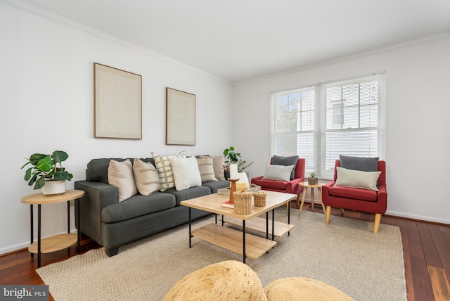 living room with crown molding, baseboards, and wood finished floors