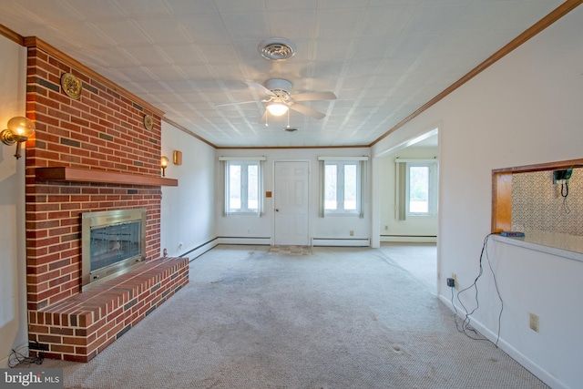 unfurnished living room with light carpet, a fireplace, ceiling fan, and a healthy amount of sunlight