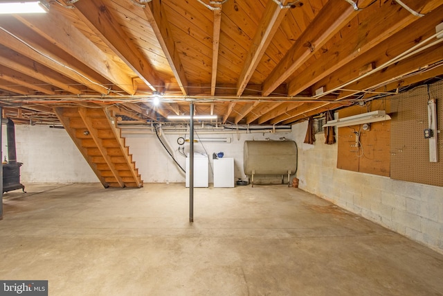 basement with washing machine and clothes dryer