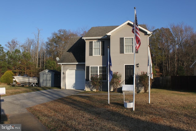 view of front property with a garage, a shed, and a front yard