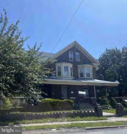 view of front of home with covered porch