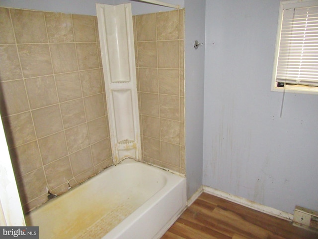 bathroom with hardwood / wood-style floors