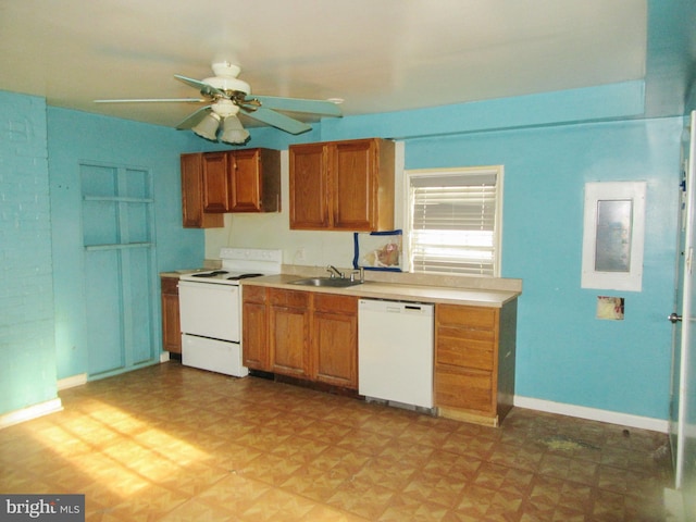 kitchen with ceiling fan, sink, and white appliances