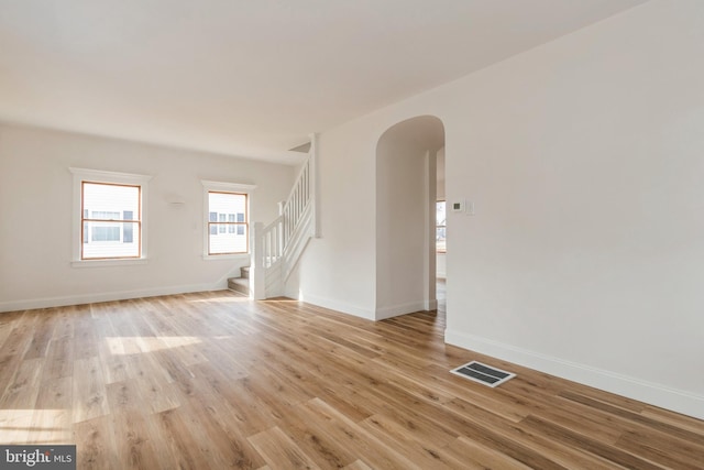 spare room with light hardwood / wood-style flooring