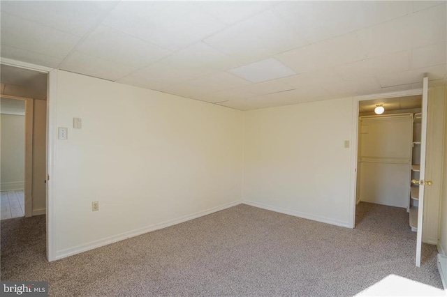 empty room featuring light colored carpet