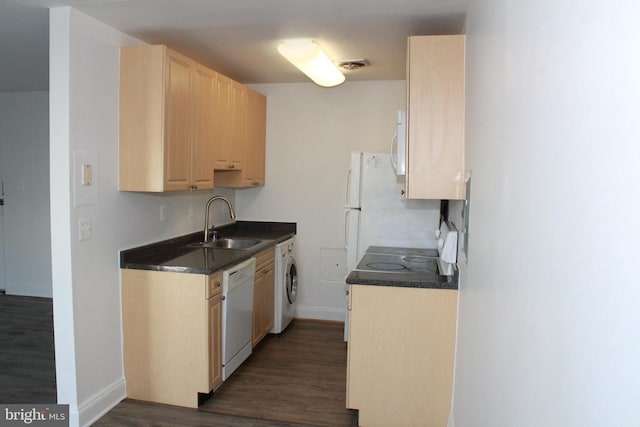 kitchen featuring light brown cabinets, white appliances, sink, dark hardwood / wood-style floors, and washer / clothes dryer