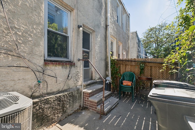 view of home's exterior with central AC unit